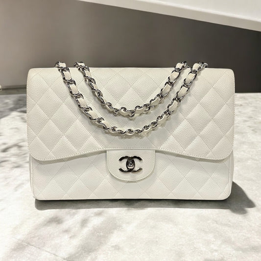 CHANEL Jumbo Classic Flap Bag in White Caviar Leather