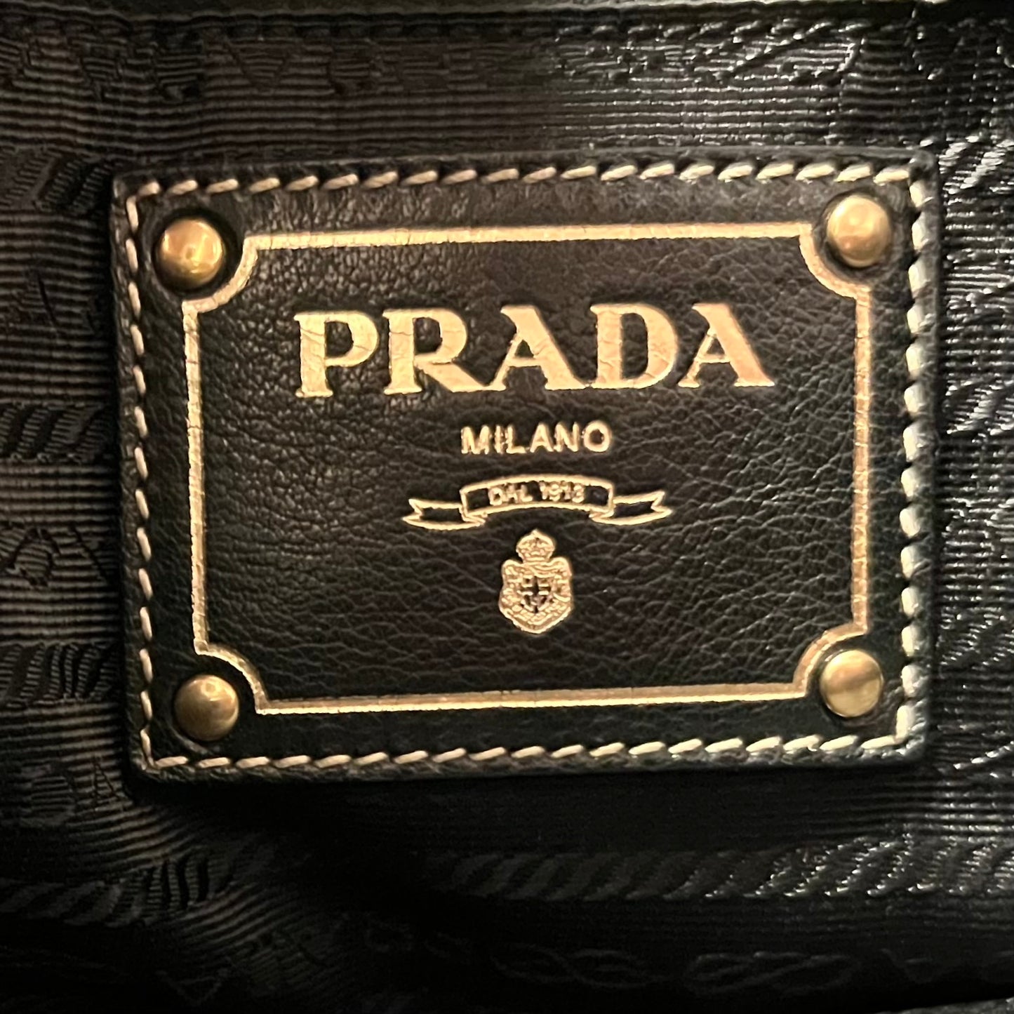 PRADA Grommet Raffia Handbag in Black