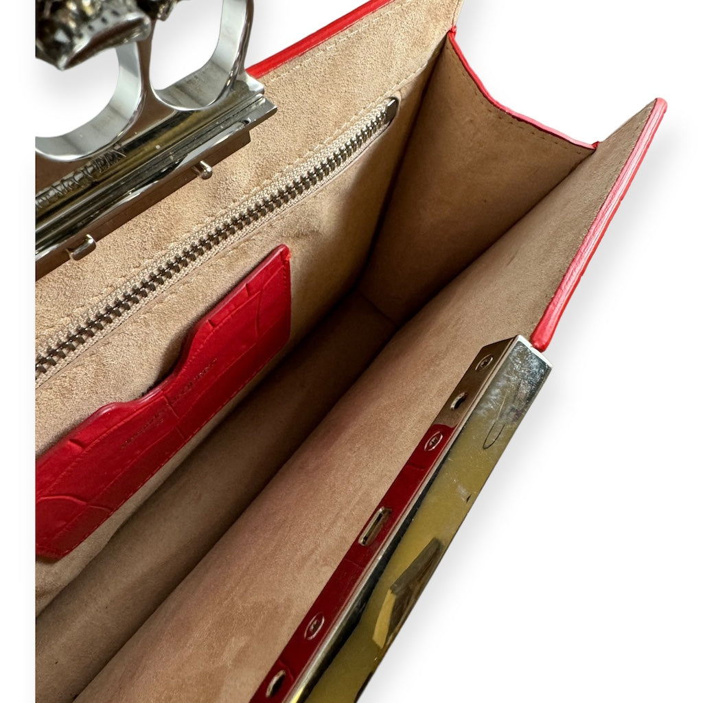 ALEXANDER MCQUEEN Embossed Knuckle Clutch in Red