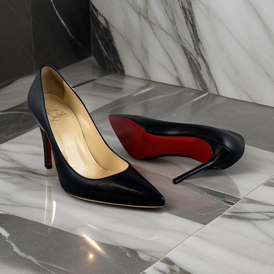 CHRISTIAN LOUBOUTIN Decollette Pumps in Black | Size 37
