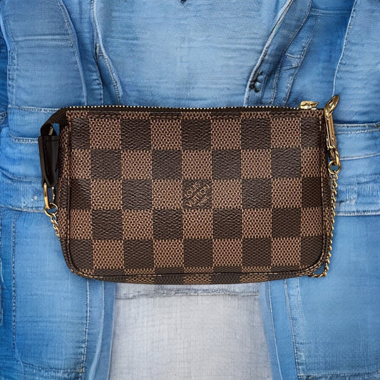 LOUIS VUITTON Pochette Accessoires in Damier Ebene