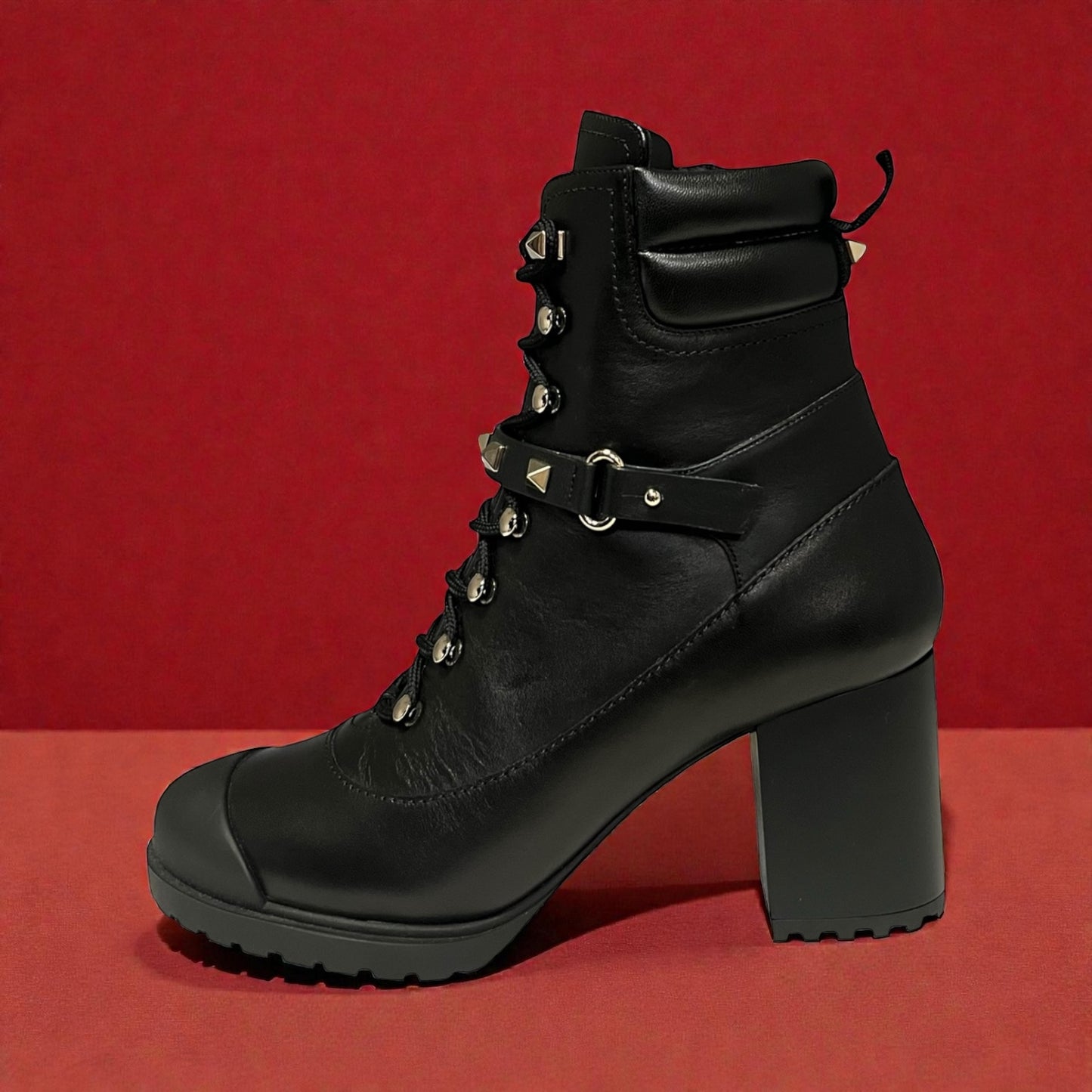 VALENTINO Rockstud Lug Sole Boots in Black | 37.5