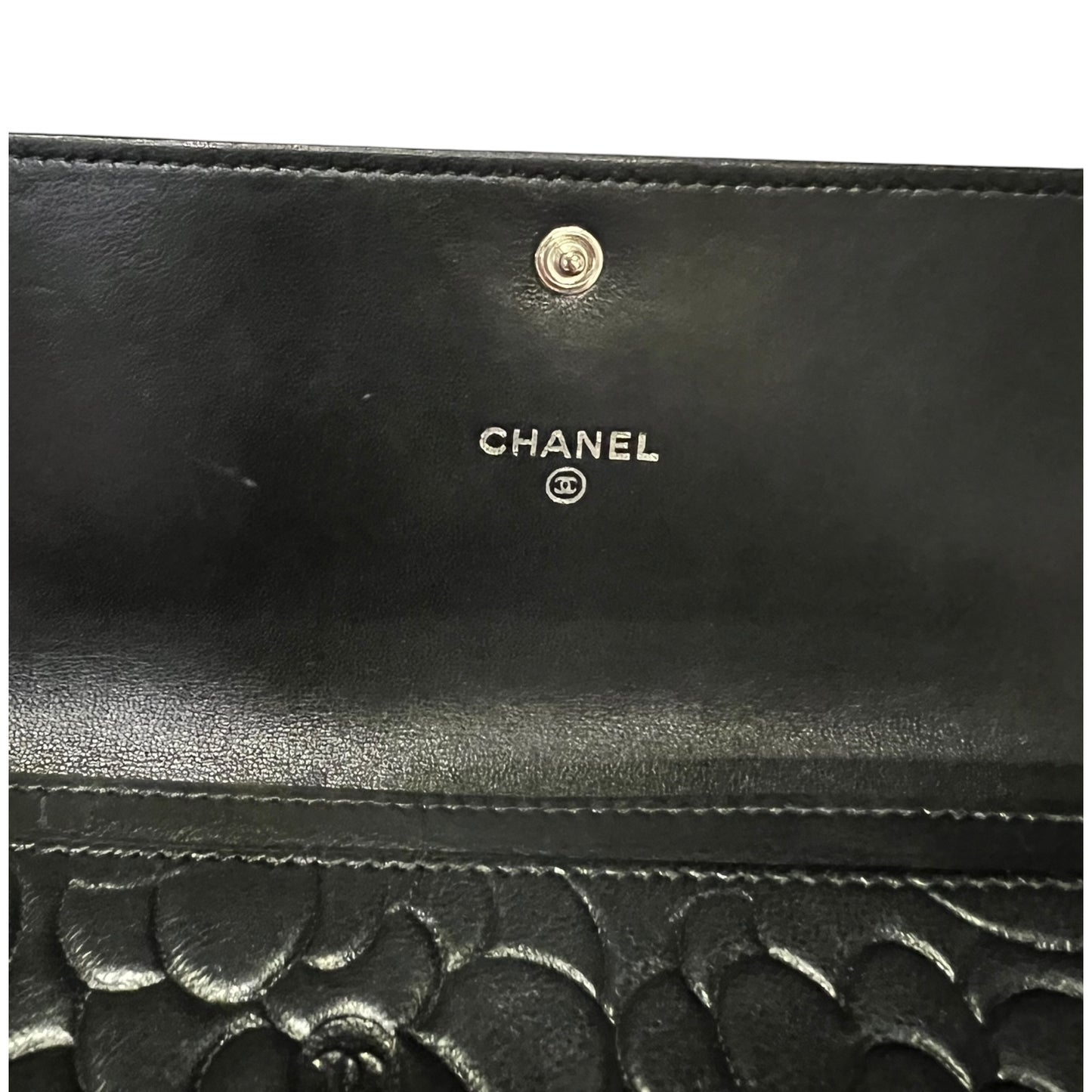 CHANEL Camellia Embossed Wallet in Black Lambskin
