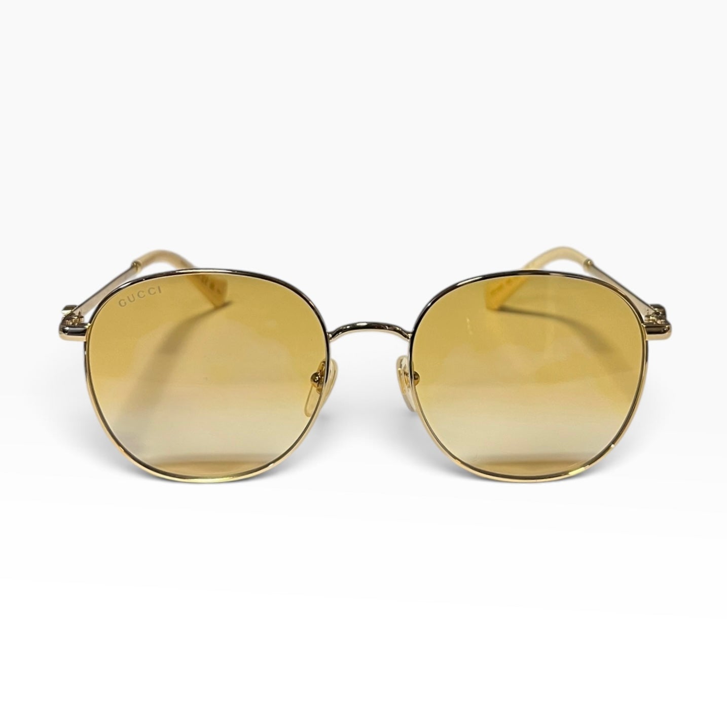 GUCCI Metal Frame Sunglasses in Amber