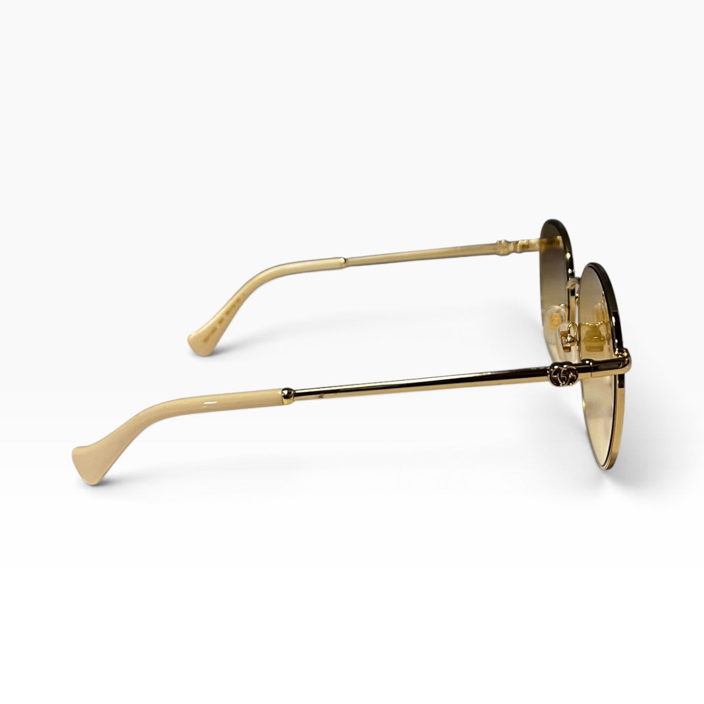 GUCCI Metal Frame Sunglasses in Amber