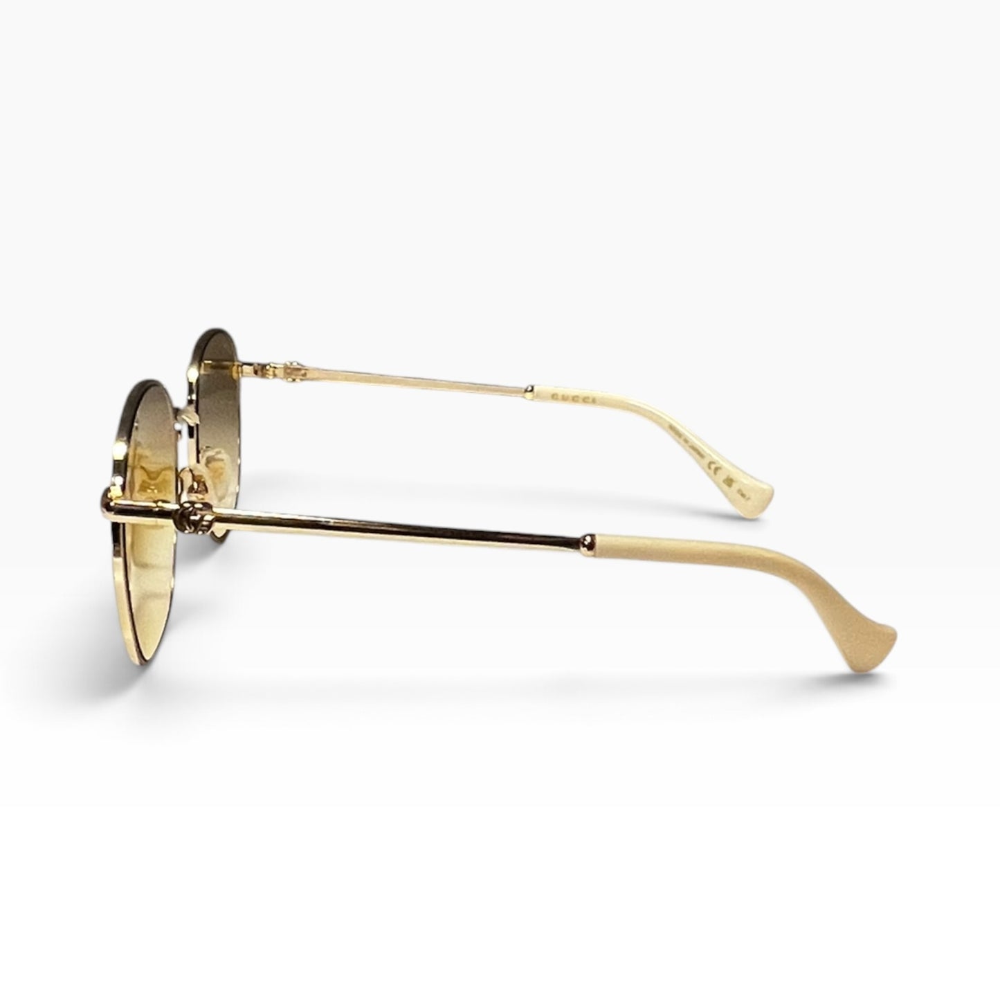 GUCCI Metal Frame Sunglasses in Amber