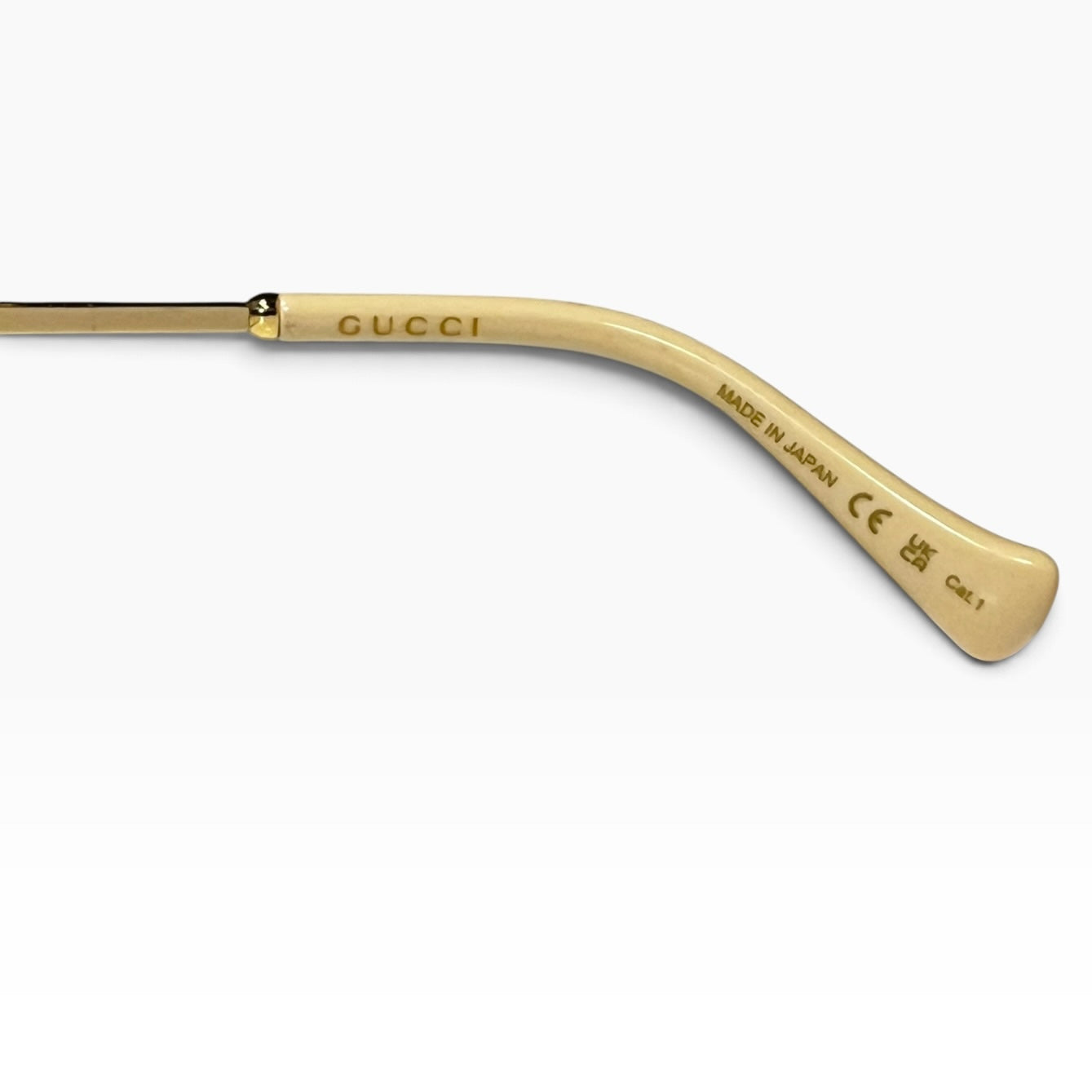 GUCCI Metal Frame Sunglasses in Amber