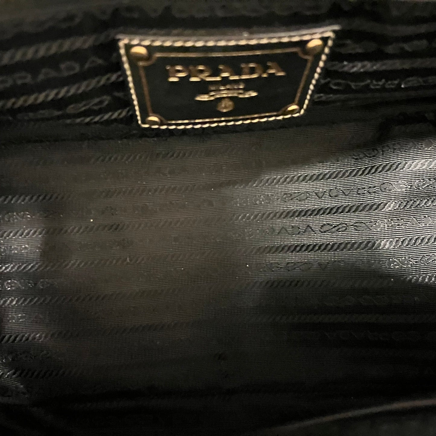 PRADA Grommet Raffia Handbag in Black