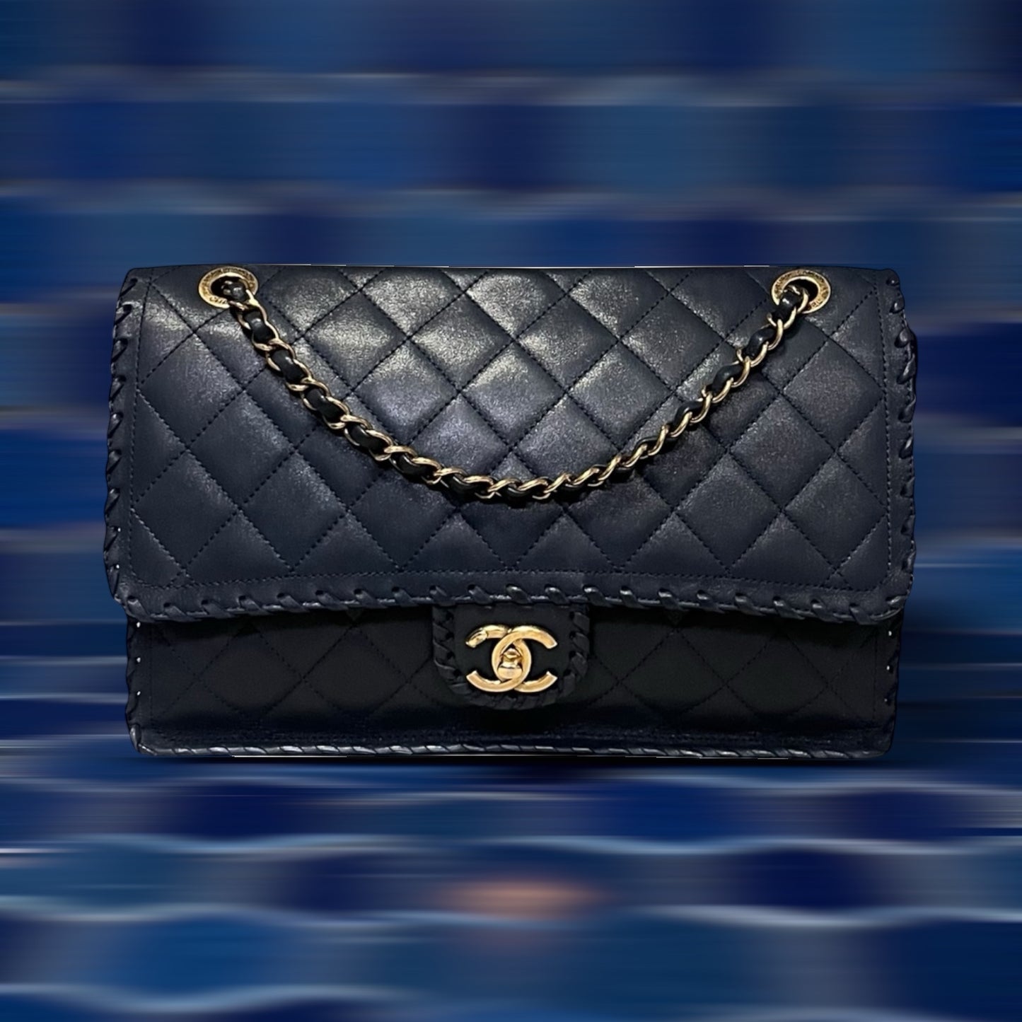 CHANEL Jumbo Happy Stitch Flap Bag in Blue