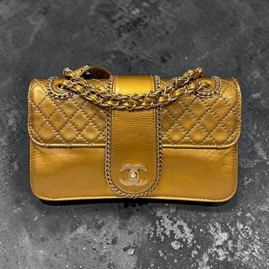CHANEL Patent Madison Flap Bag in Gold