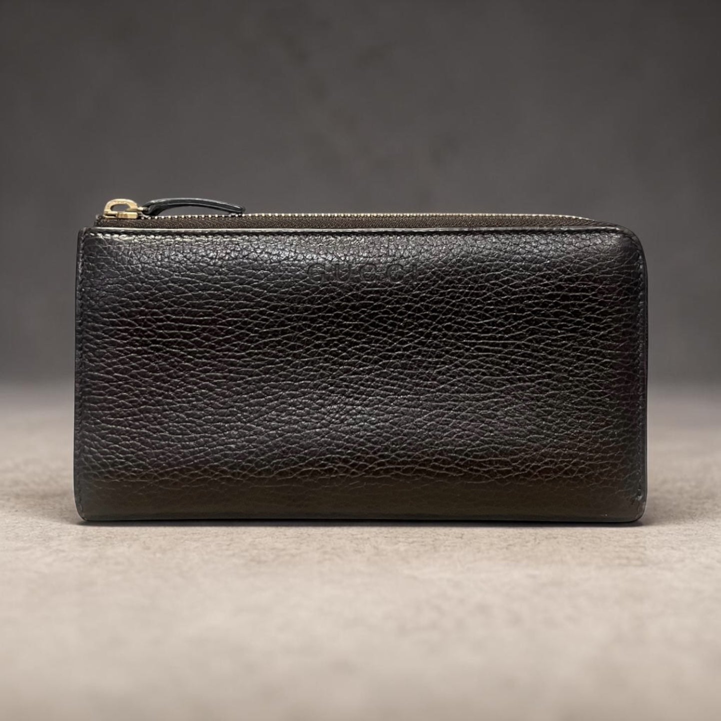 GUCCI Pebble Leather Zip Around Wallet in Dark Brown