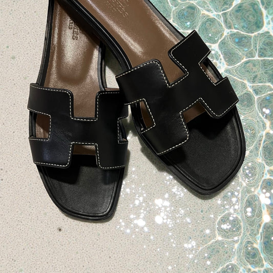 HERMES Oran Slide Sandals in Black | 36.5