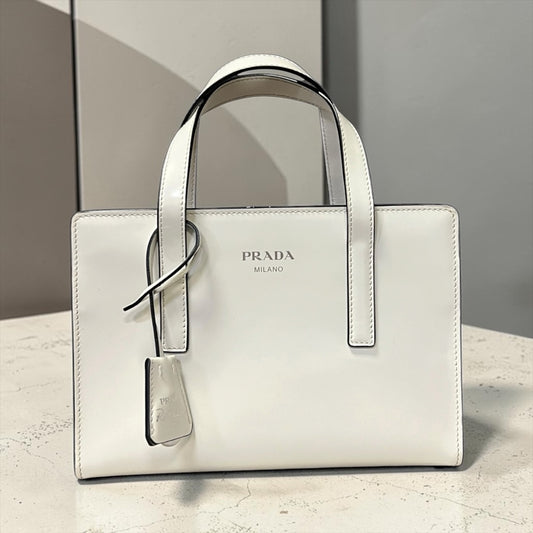 PRADA Re-edition 1995 Top Handle Crossbody in White