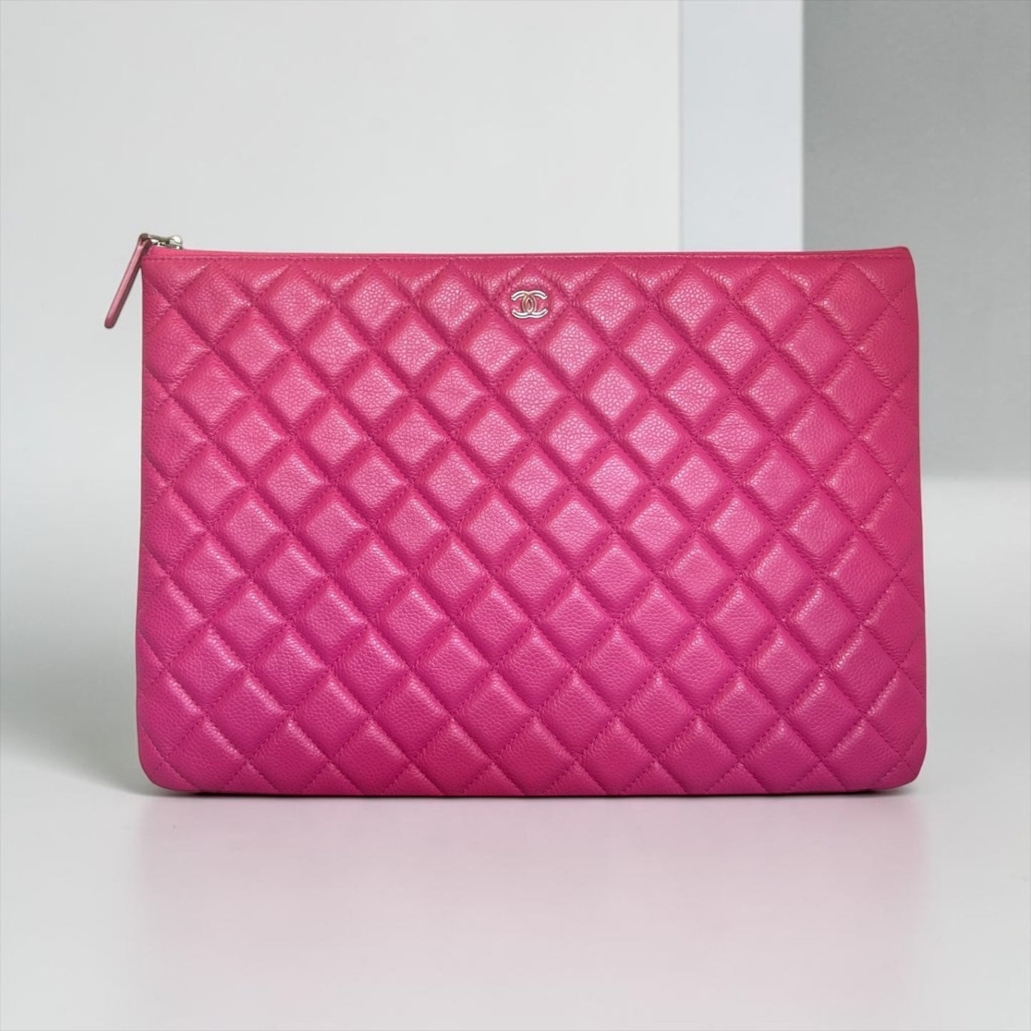 CHANEL Diamond Quilted Large O-Case in Pink