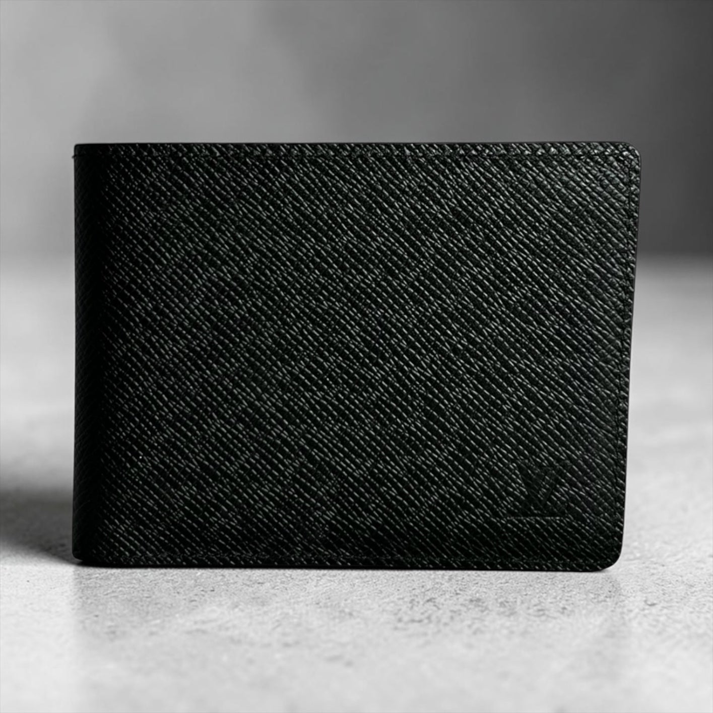 LOUIS VUITTON Multiple Wallet in Black Taiga