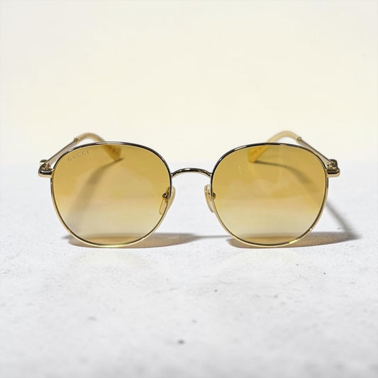 GUCCI Metal Frame Sunglasses in Amber