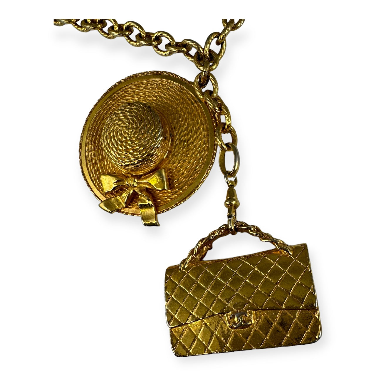 CHANEL Chapeau + Flap Bag Necklace in Gold