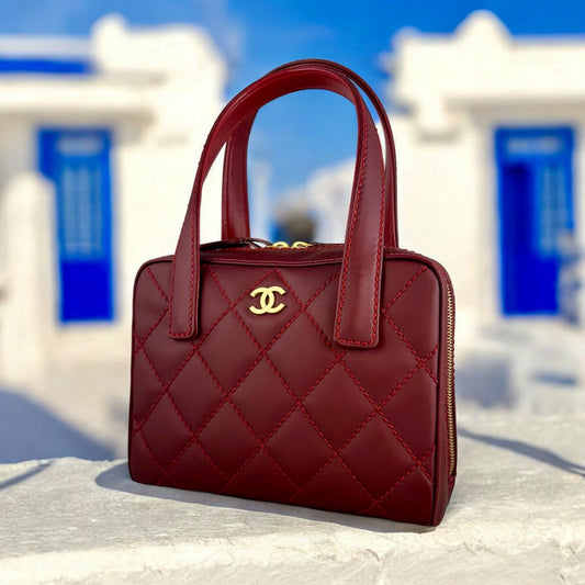 CHANEL Wild Stitch Bowler Bag in Ruby