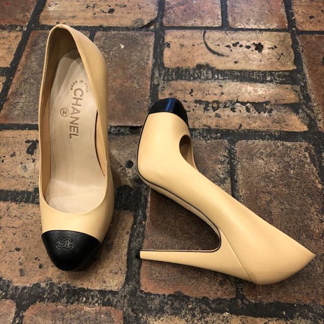 beige and black cap toe heels