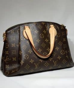 Lot - Louis Vuitton Rivoli monogram business handbag purse: coated