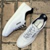 CHANEL CC Leather Sneakers in White (40.5) 1