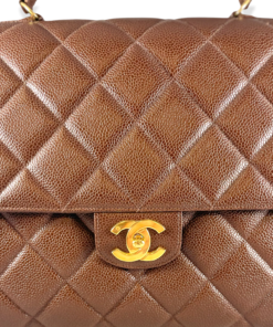 CHANEL Caviar Quilted Handbag in Brown 13