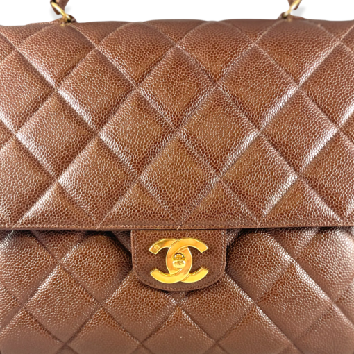 CHANEL Caviar Quilted Handbag in Brown 6